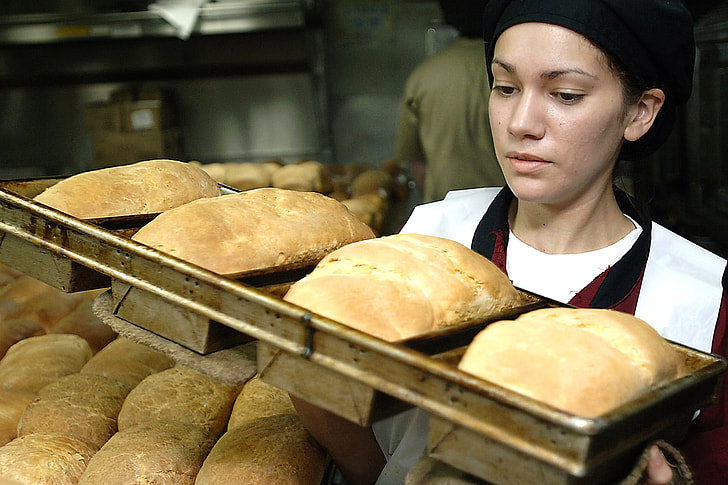 person baking breads