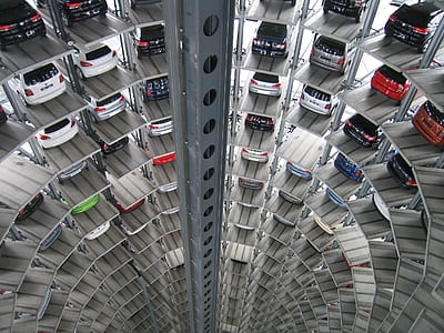 assorted-color vehicle tower parking lot