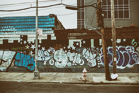 Wide angle shot of a graffiti-covered street in Williamsburg, Brooklyn, New York City