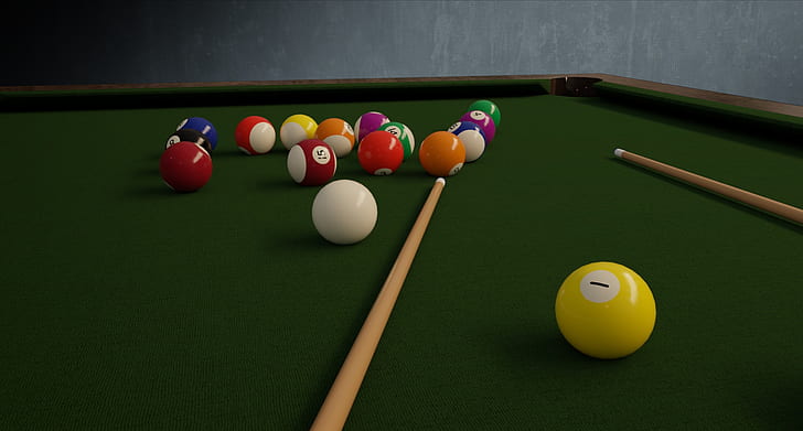 billiard balls and cue sticks on green pool table