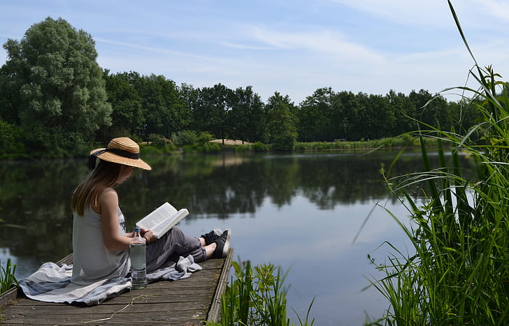 Royalty-Free photo: Woman reading outdoors | PickPik
