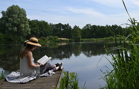 woman reading outdoors