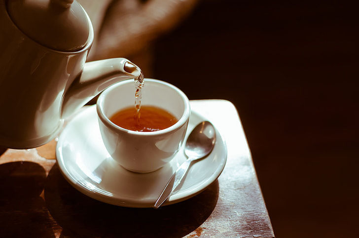 teacup pour with tea