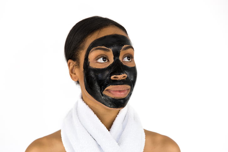 woman in black facial mask