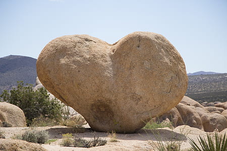 heart-shaped brown rock formation