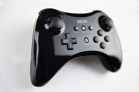 Nintendo Wii U Pro Controller shot against a white background, image captured with a Canon DSLR