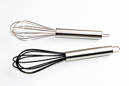 two staineless steel hand whisk mixers