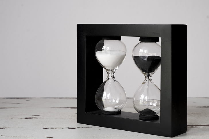 black framed hourglasses