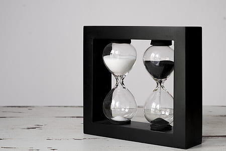 black framed hourglasses