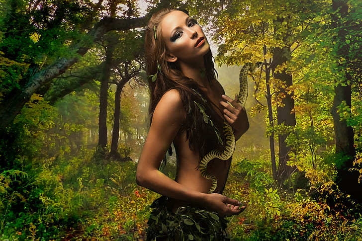 woman wearing green leaf clothes in forest