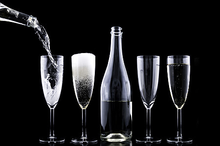 Champagne being poured into glasses