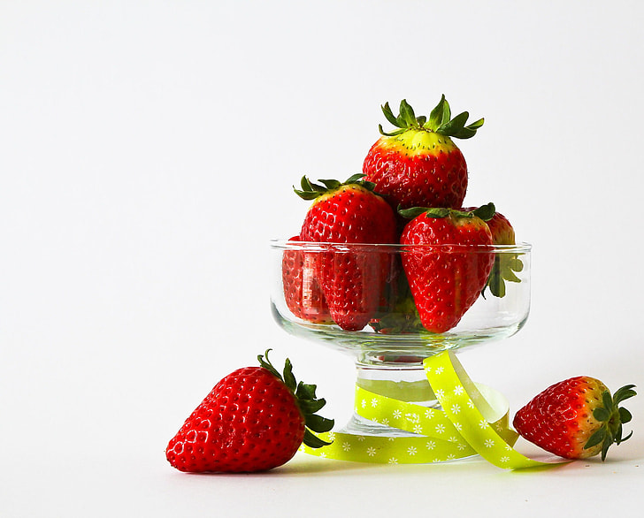 food photography of bowl of strawberry fruits
