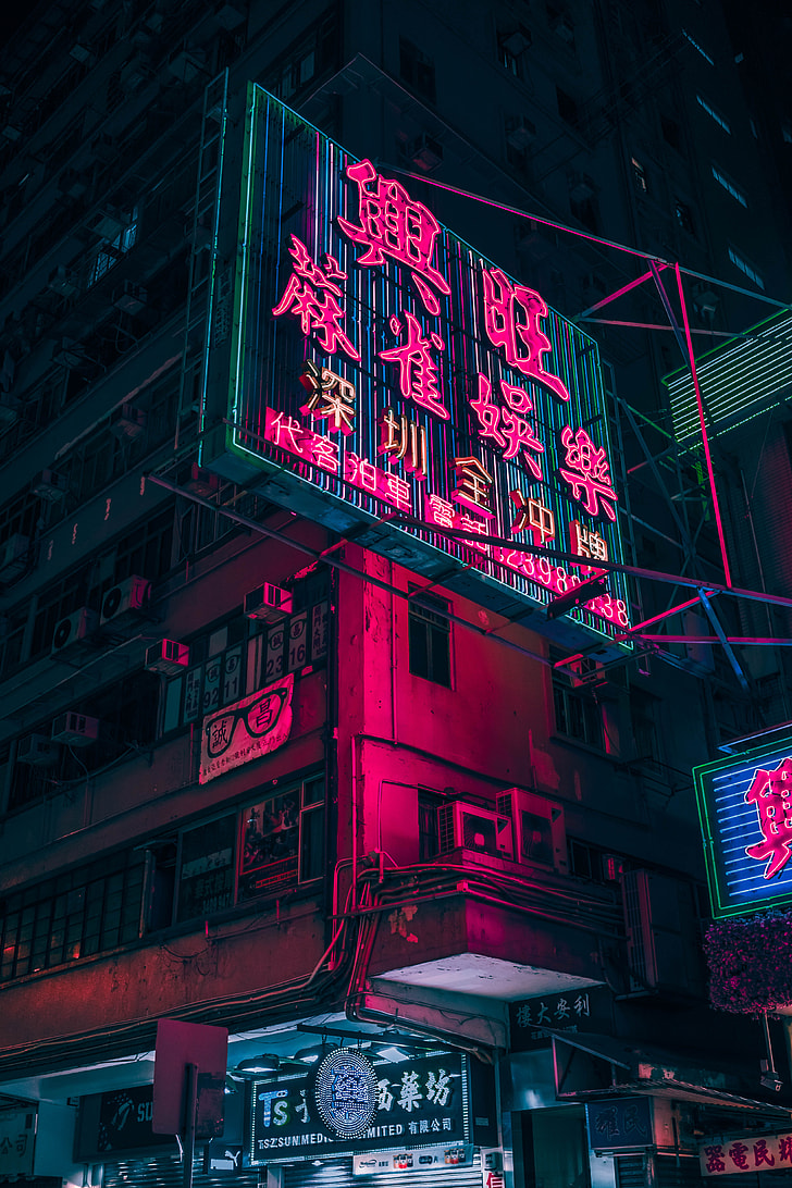 pink Kanji text LED signage during nighttime