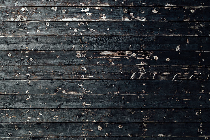 closeup photo of black wooden surface