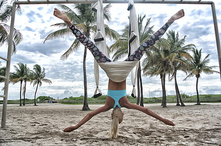 Woman Doing Anti-Gravity Yoga