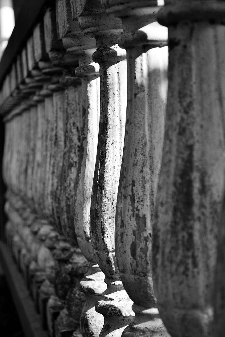 grayscale photography of concrete baluster
