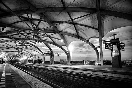 Grayscale Architectural Photography of Empty Train Station