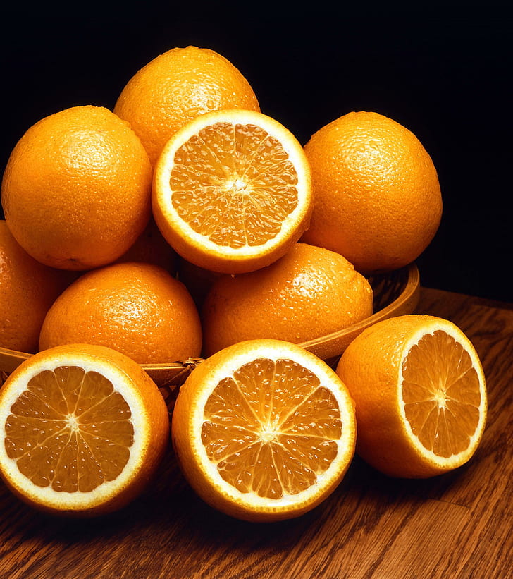 still life photo of bunch of orange fruits