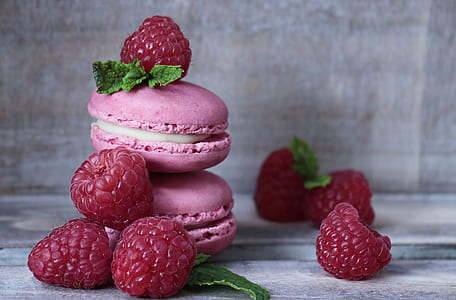 bunch of strawberries and macarons