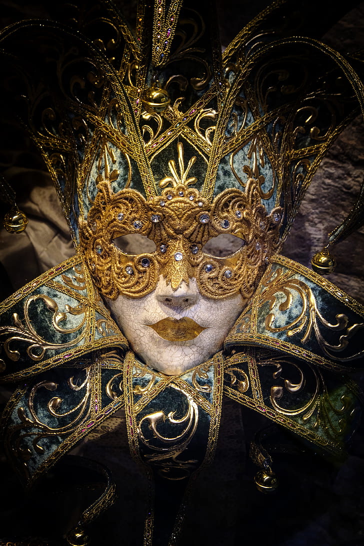 low light photography of gold mask