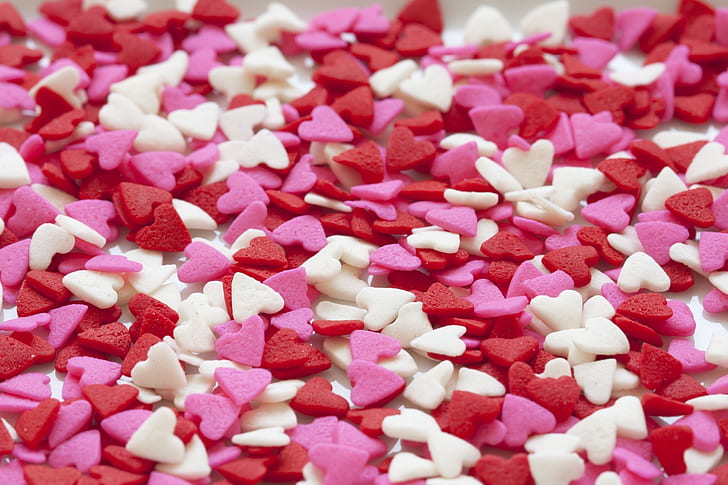 white and pink heart party favors