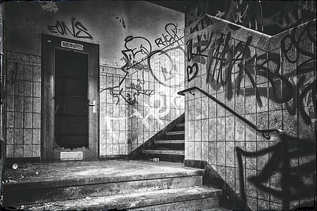 graffiti on walls inside building