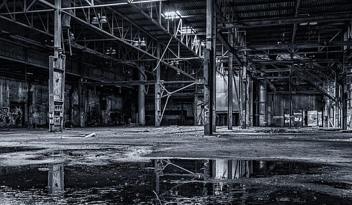 grayscale photography of inside the building