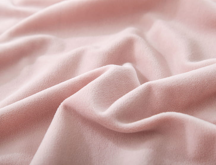 close up photo of pink fleece textile