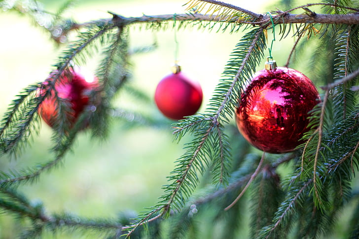 three red Christmas baubles
