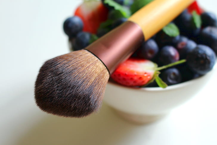 brown wooden makeup brush