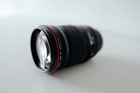 black DSLR camera lens