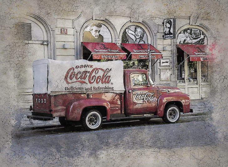 red and white Coca-Cola truck near building