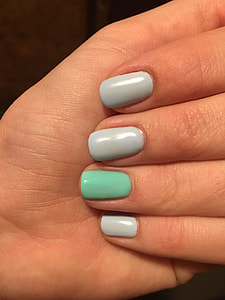 grey and teal nail polishes