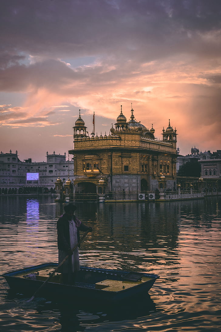 photo of golden temple during sunset