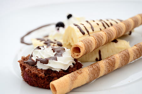 yellow banana, chocolate cupcake and chocolate sticks dessert