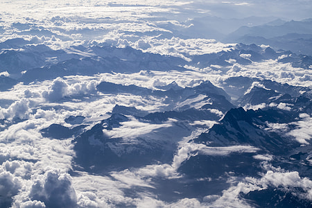 aerial photography of mountain covered with clouds during daytime