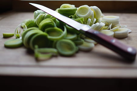 sliced vegetable and knife