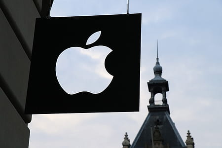 shallow focus photography of Apple logo signage