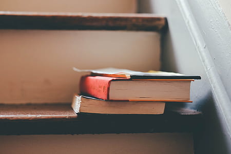 two books on stairs