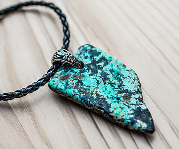 black cord necklace with turquoise pendant