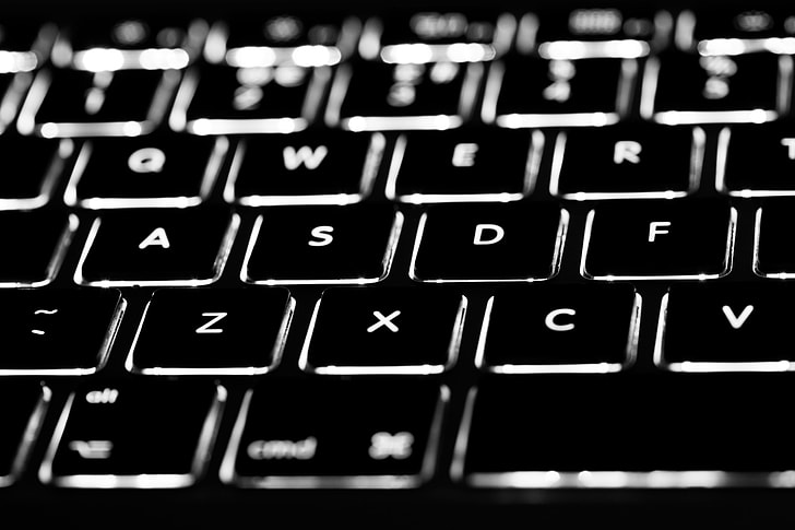 Macro shot of the backlit keyboard of a laptop, image captured with a Canon DSLR and 100m macro lens