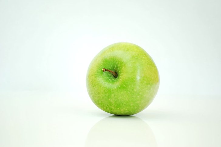 green apple with white background