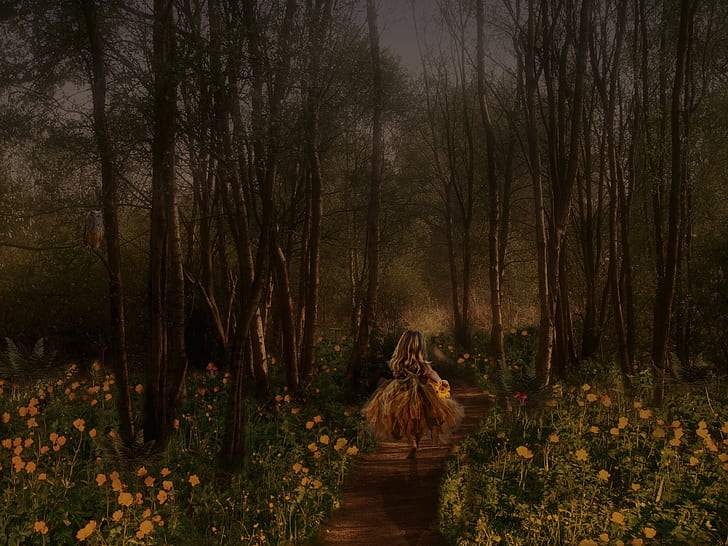 woman walking in the middle of forest with yellow flower field