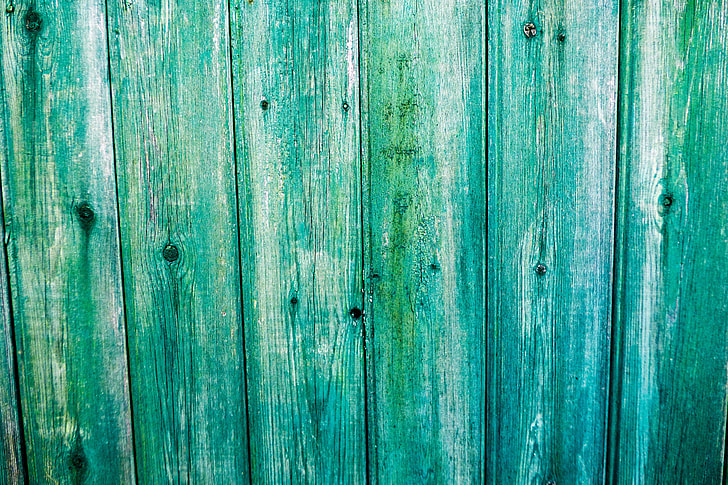 Closeup shot of a green wood fence. High-resolution download