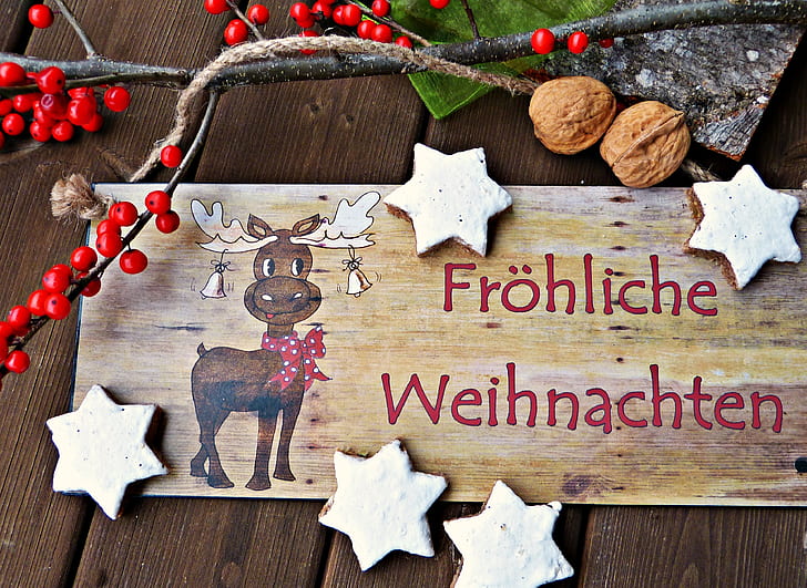 brown wooden plank with reindeer painting
