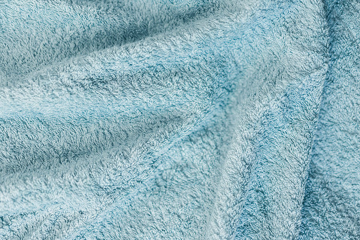 Royalty-Free photo: Soft Cotton Blue Towel Close Up Background | PickPik