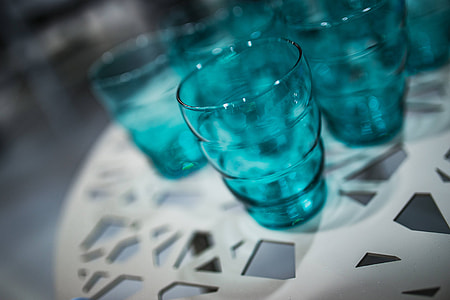 White table with cyan glasses