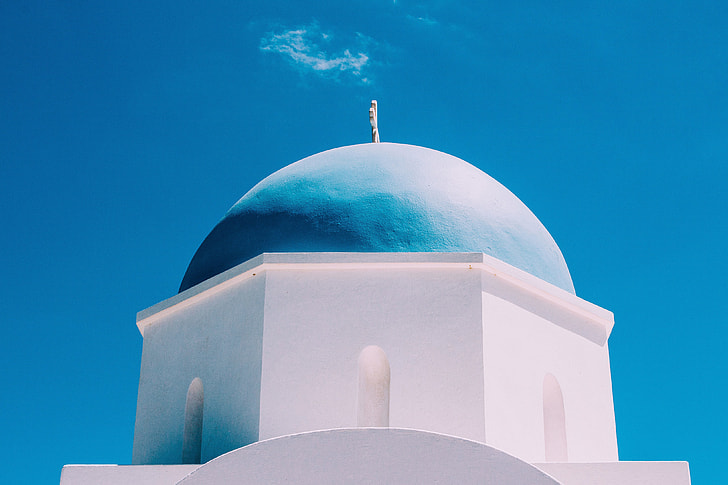 A classic blue-domed church in Greece