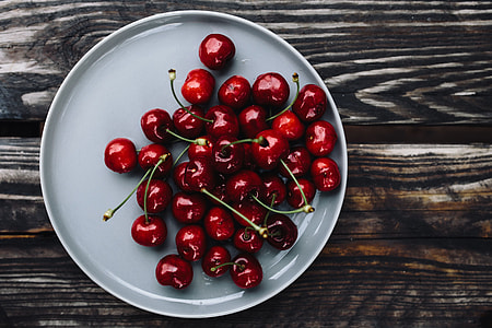 Fresh Cherries on a simple plate