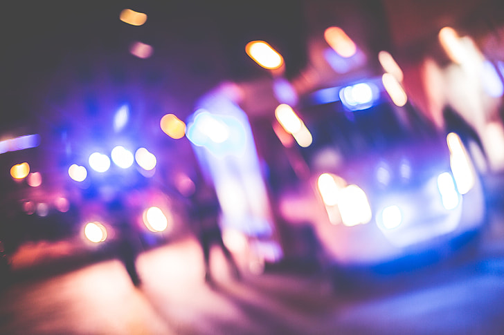 Blurred Emergency Cars At Night